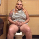 A fat, blonde girl takes a gassy, loose-sounding shit and a piss while sitting on a toilet in a coffee shop public restroom. She rubs her belly and wipes her ass when finished. Presented in 720P HD. About 5 minutes.